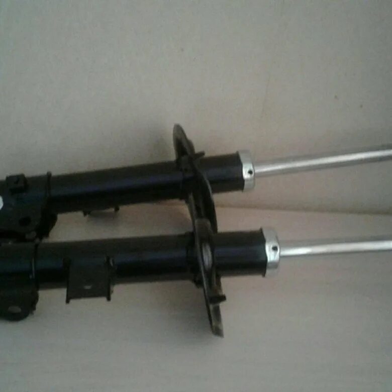 Kia sportage 3 передние стойки. Ремонт передней стойки рав 4. Передняя стойка опель антара 2. Стойка передняя спортаж 3. Стойки киа спортейдж 3.