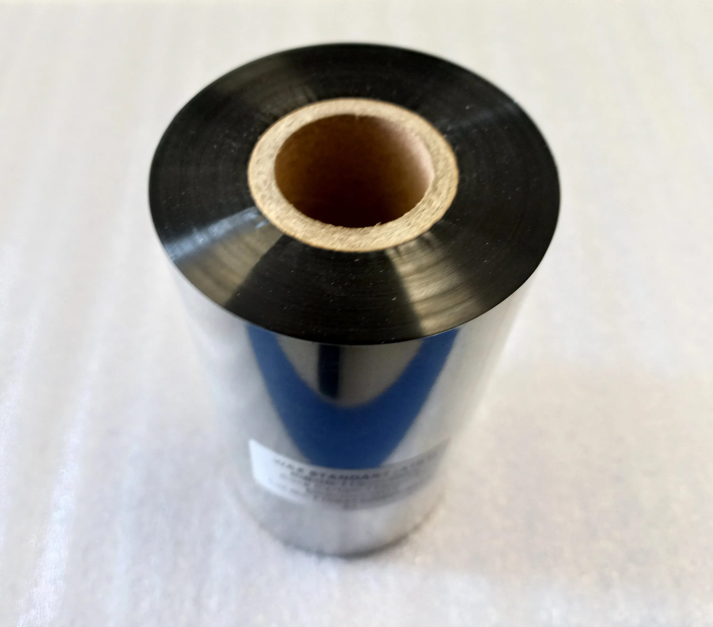 Риббон восковой 110mm. Риббон wax 110ммx300м, втулка 25мм. Риббон, 300м/110мм/110мм. Риббон термомарк. 5" х 110мм, out, wax standard (007) намотка по левому краю.