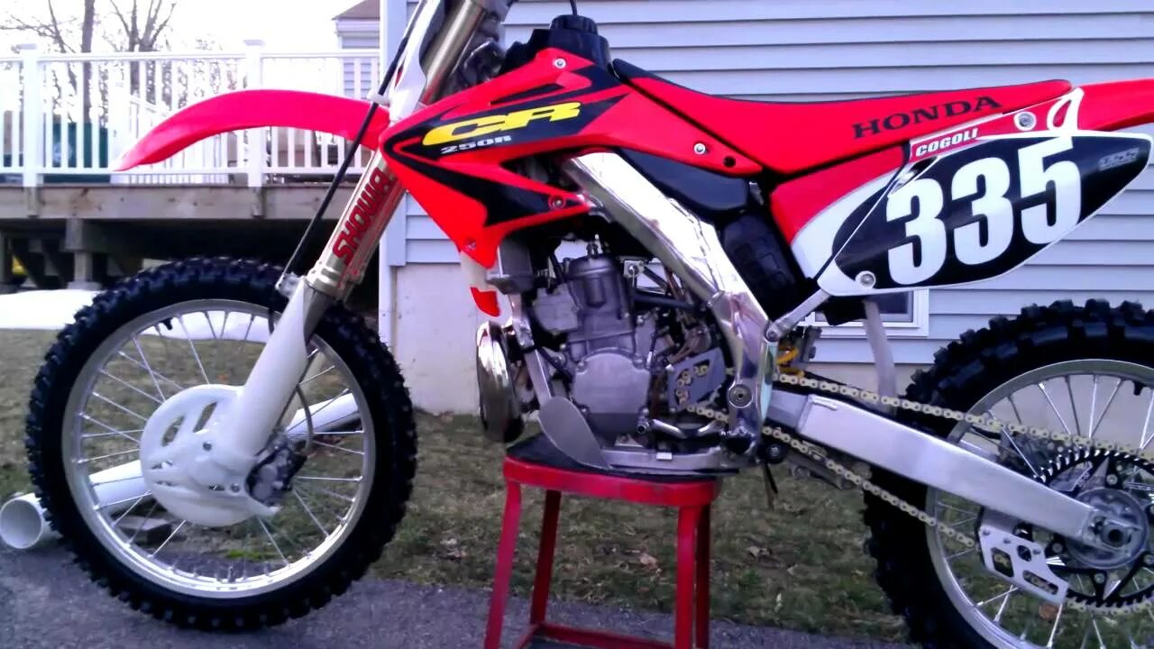 Honda cr 2003. Honda XR 250 FMF P Core. CR 125 Honda гильза. Хонда ЦР 250. Боковая подножка Honda cr250.