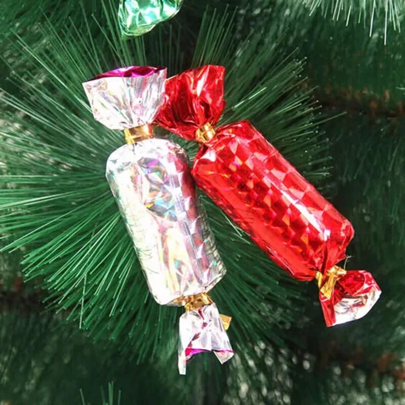 Новогодняя игрушка конфета. Новогодние игрушки конфета. Елочная игрушка леденец. Елка с конфетами. Елочное украшение конфета.