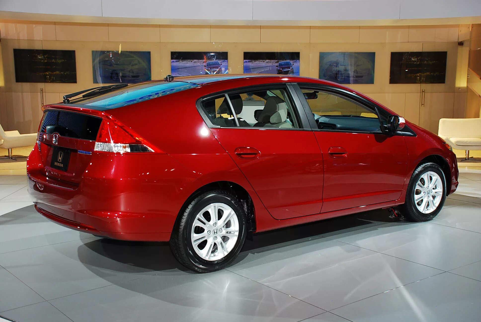 Хонда гибрид автомобиля. Honda Insight 2009. Хонда Инсайт гибрид 2009. Хонда Инсайт гибрид. Honda Insight 2011.