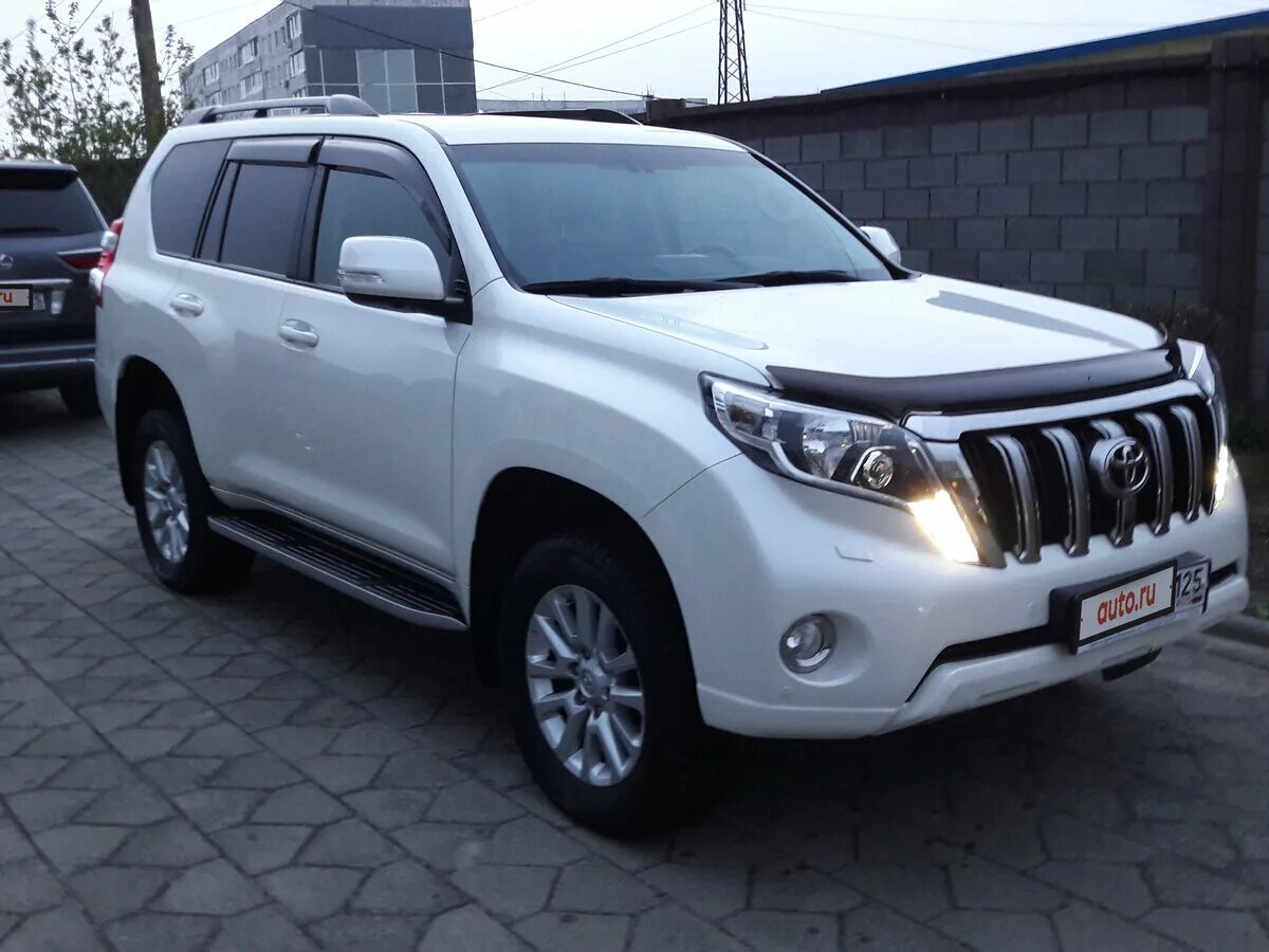 Купить прадо в новгороде. Land Cruiser Prado 2015 белый. Land Cruiser Prado 150 2015 Series. Тойота Прадо 4 ВД 6х6. Сколько весит Тойота Прадо 150.