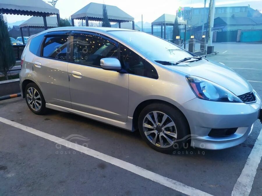 Хонда фит левый руль. Honda jazz 2007 оранжевый. Хонда фит с левым рулем. Хонда фит 2012г. Хонда фит 2009г.