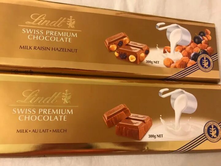 300 шоколада. Швейцарский шоколад Lindt. Шоколад Линдт Швейцария. Шоколад Линдт 300 гр. Шоколад швейцарский молочный Lindt.