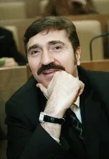 Комисаров