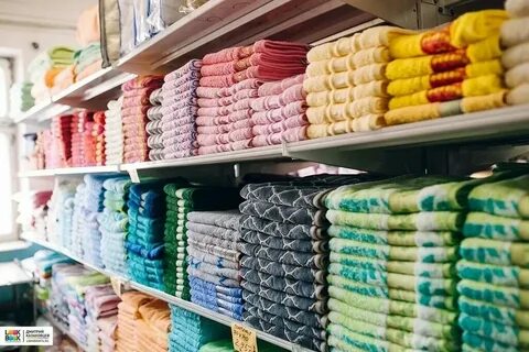 Розничную торговлю текстильными изделиями