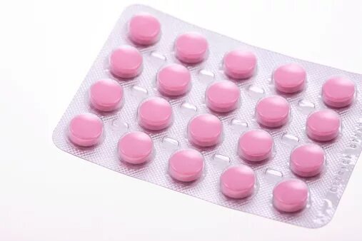 Розовые таблетки название. Таблетки розового цвета. Розовые круглые таблетки. Розовые таблетки обезболивающие.