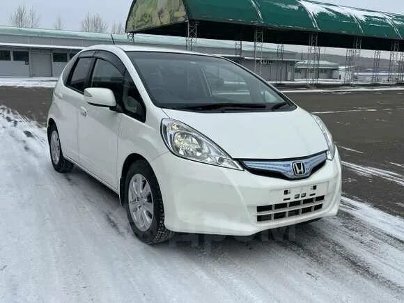 Фит гибрид 2011. Honda Fit Hybrid 2011. Honda Fit 2011. Хонда фит гибрид 2011. Хонда фит 2011 серебро.