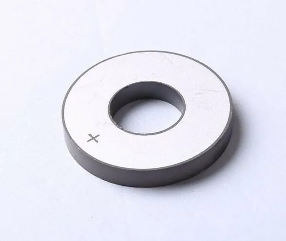 пьезокерамика. цирконат титанат свинца. современные пьезокерамика. пьезокерамическая пластина. пьезокерамические кольца.