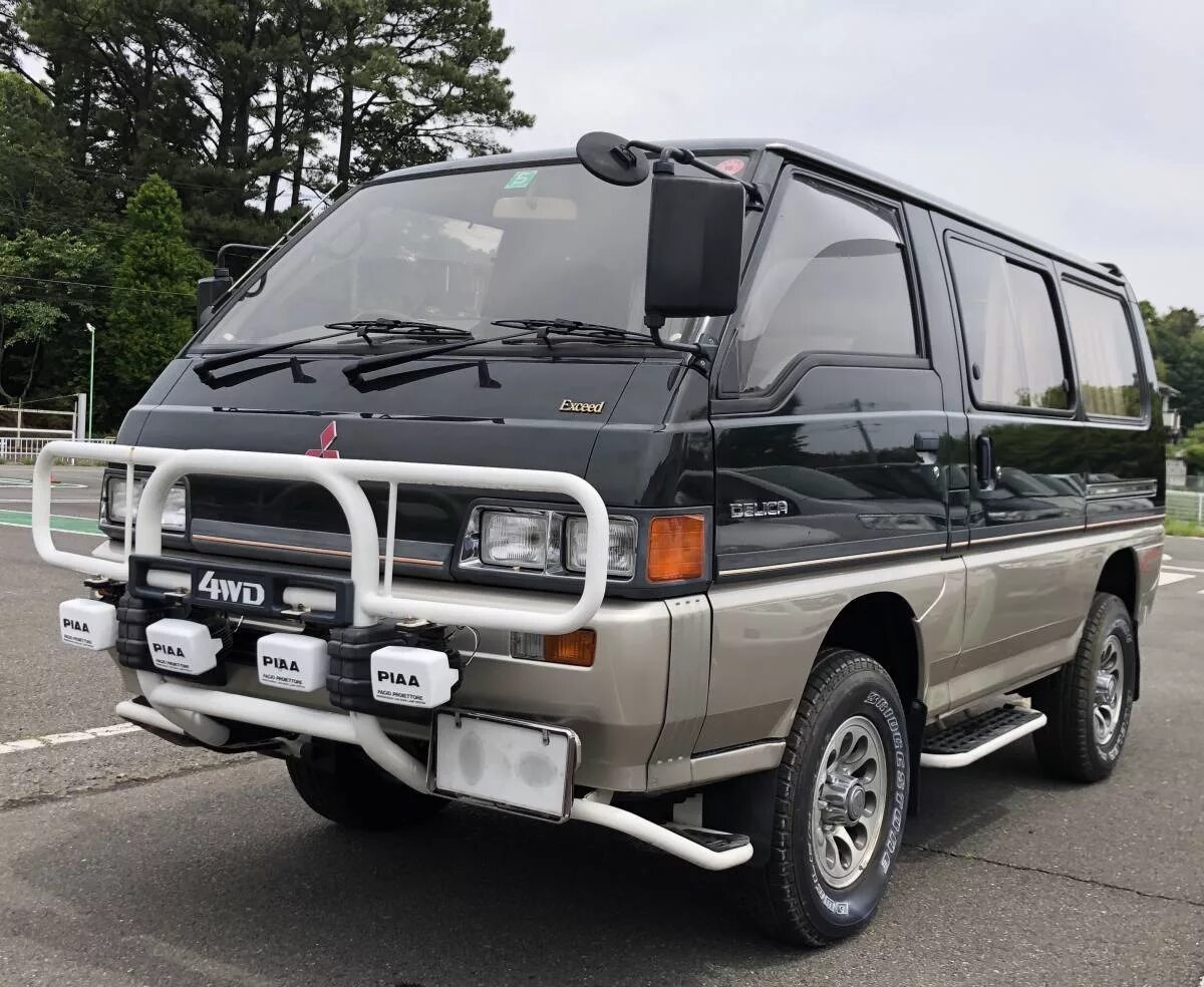 Delica поколения. Делика p25w. Делика 2 поколение. Mitsubishi Delica p25w. Митсубиси Делика 2 поколения.