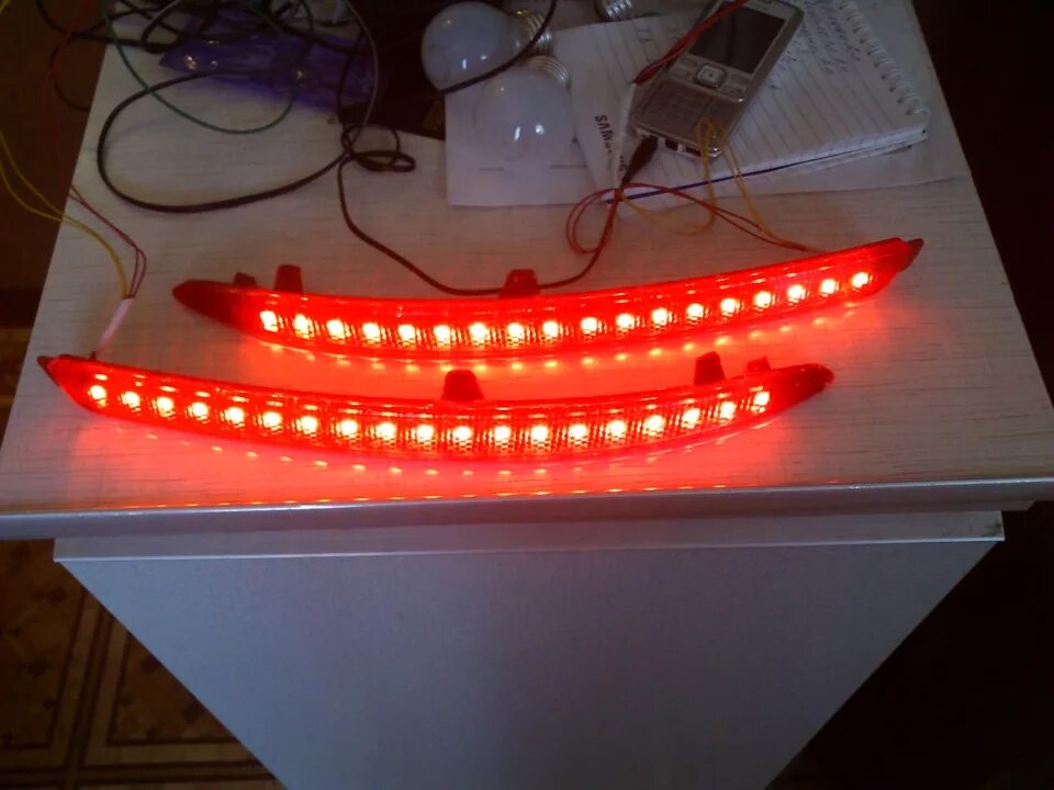 Катафоты приора 1. Светодиодные катафоты в задний бампер лансер 10. Led катафоты солярис 2. Led катафоты ford focus 2 хэтчбек. Светодиодные катафоты grand vitara.