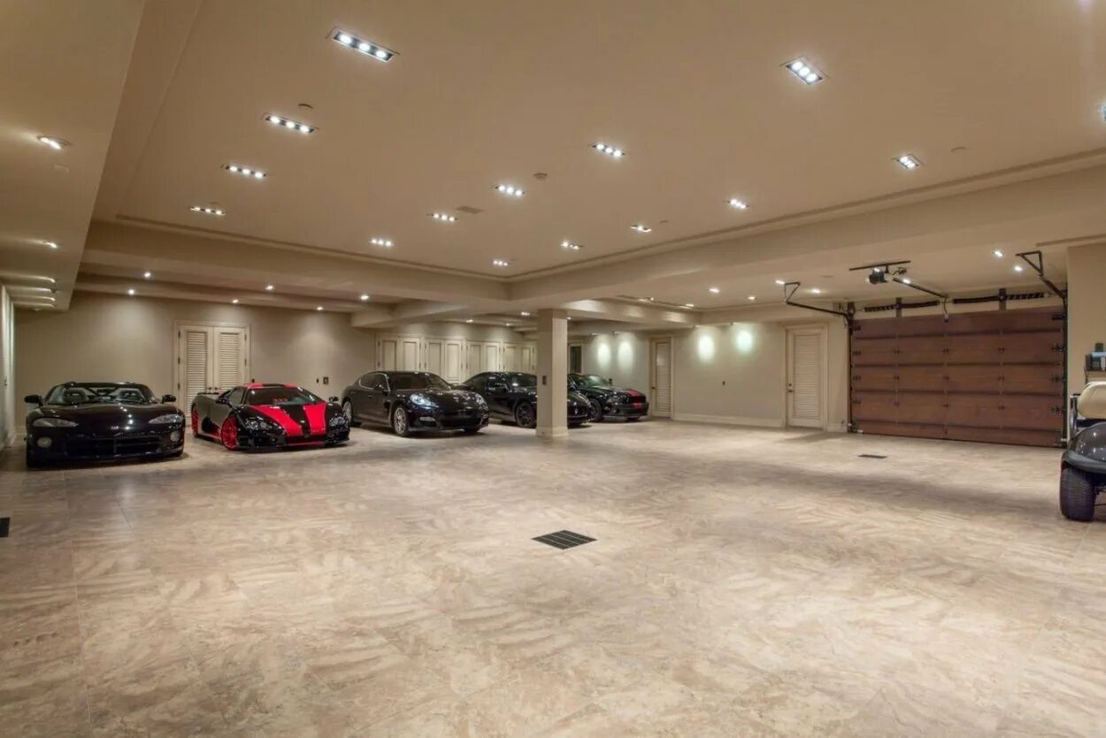 Красивый гараж. Интерьер большого гаража. Шикарный гараж. Элитный гараж. Красивые гаражи внутри