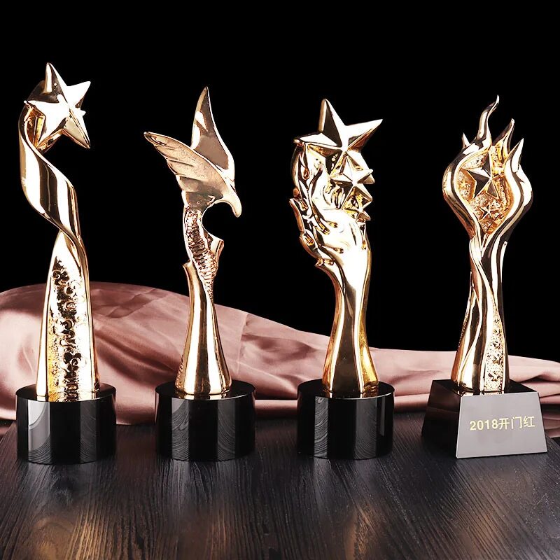 Награды мод. Наградные статуэтки. Награды мод. Разновидности приза. Награждение модельеров.