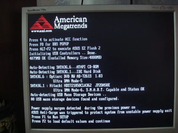 American MEGATRENDS f1 или f2. Материнская плата American MEGATRENDS. Экран при включении компьютера. Экран American MEGATRENDS.