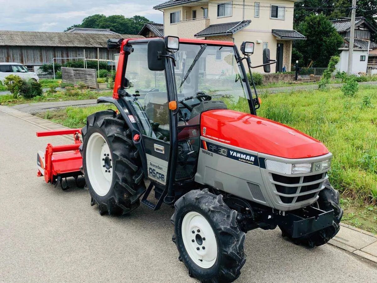 Янмар 30 с кабиной минитрактор. Yanmar af30. Японский трактор Янмар af560 с кабиной. Японский минитрактор Yanmar.