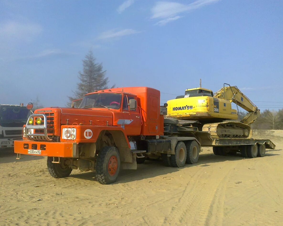 Ниссан юза 520. Nissan diesel лесовоз. Ниссан дизель uza-520. Ниссан юза 520. Komatsu-nissan diesel knwf-12t.
