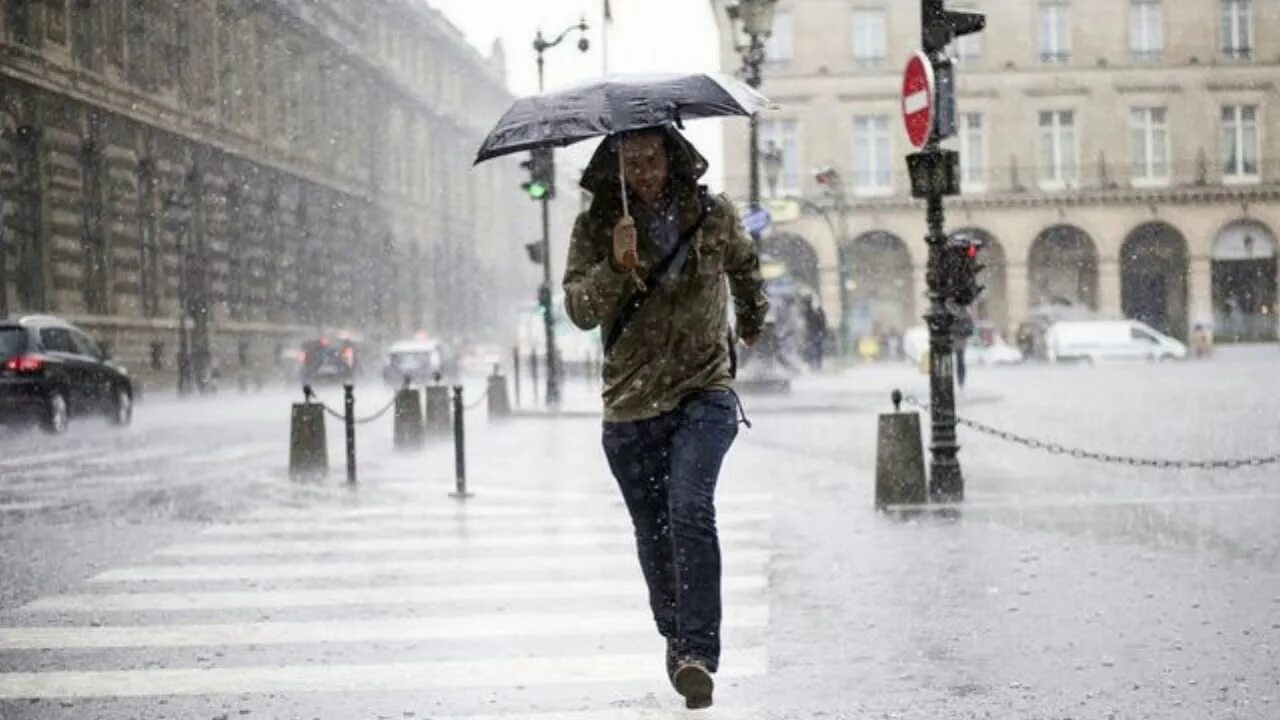 Why is it raining. Pour weather. was raining. girl with glasses in rainy weather.