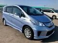 Honda freed 2014. Honda freed. Хонда Фрид 2014 года. Хонда Фрид 5 местный. Хонда Фрид 2015 года.