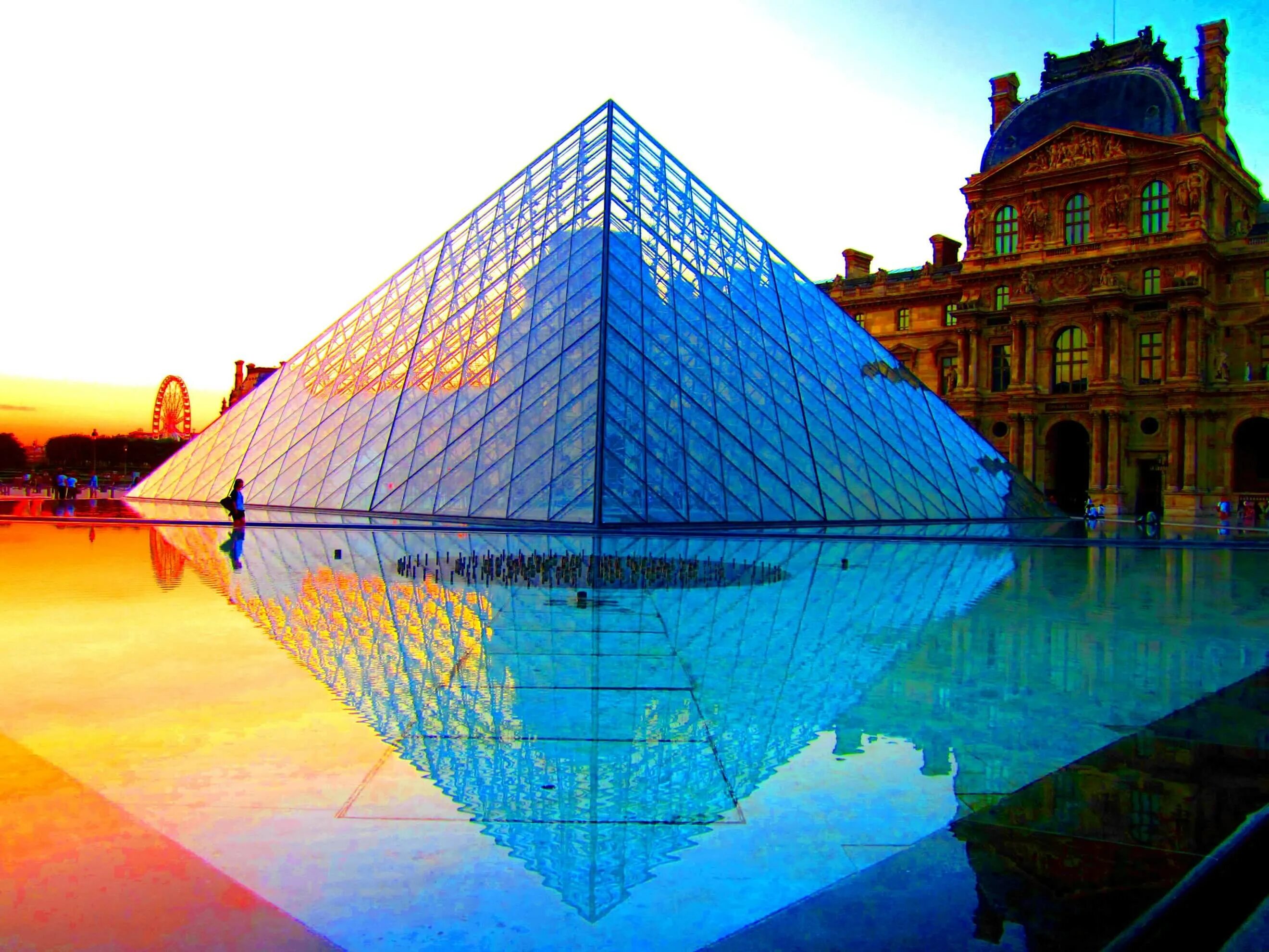 Сооружения нового времени. Лувр зеркальная пирамида. Лувр стеклянная пирамида. Новый Орлеан здание тетраэдр. Пирамида во Франции стеклянная.
