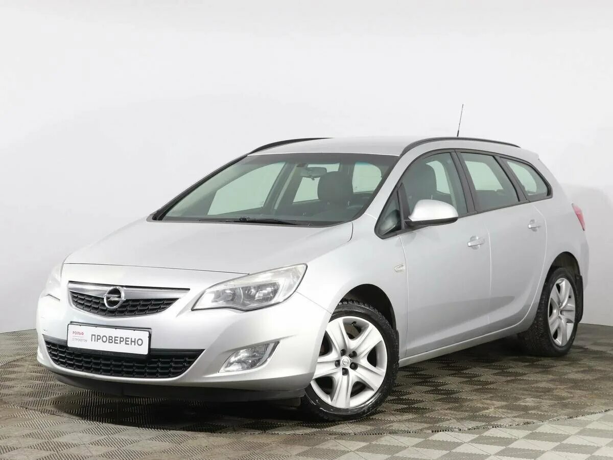 Опель универсал 2011. Opel Astra j 2011. Opel Astra универсал 2011.