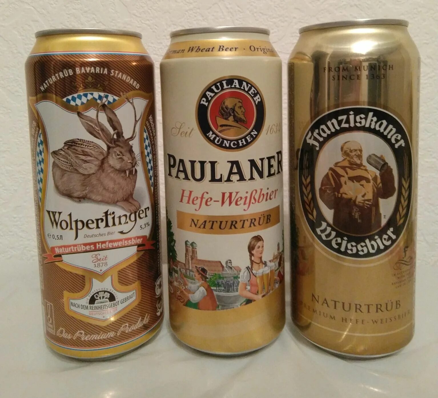Импортное пиво купить. Немецкое пшеничное нефильтрованное пиво. Пшеничное нефильтрованное пиво марки. Пиво баночное Германия пшеничное. Пиво нефильтрованное пшеничное Германия в банках.