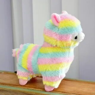 Мягкую игрушку разноцветную
