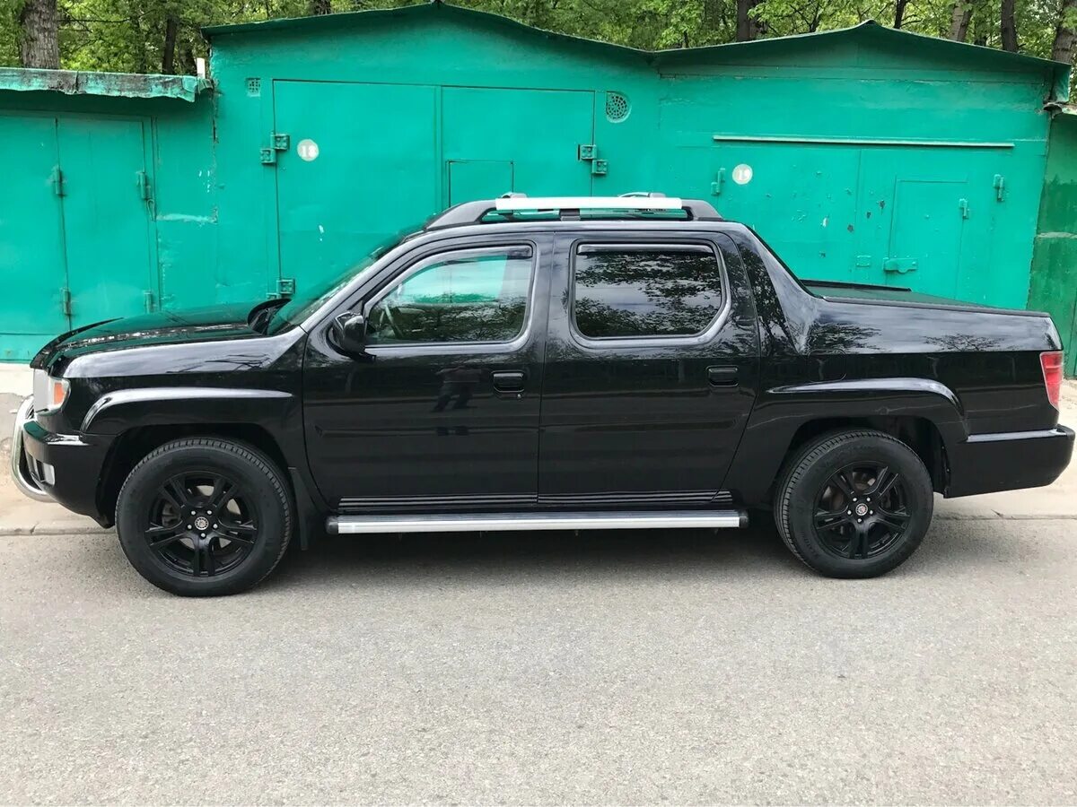 Хонда риджлайн купить. Honda Ridgeline 4wd. Хонда пикап Риджлайн 2006. Honda Ridgeline Gen 1. Хонда Риджлайн Рестайлинг.