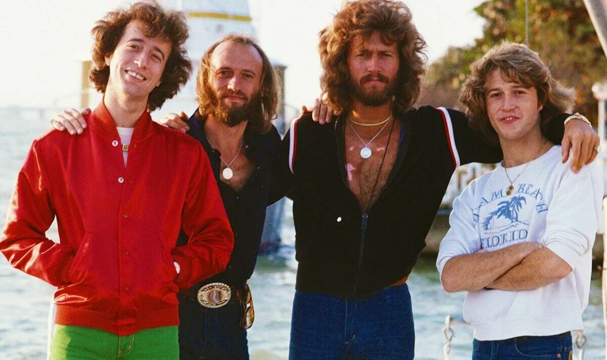 Братья гибб. Робин и моррис гибб (bee gees),. энди гибб. bee gees 1986.