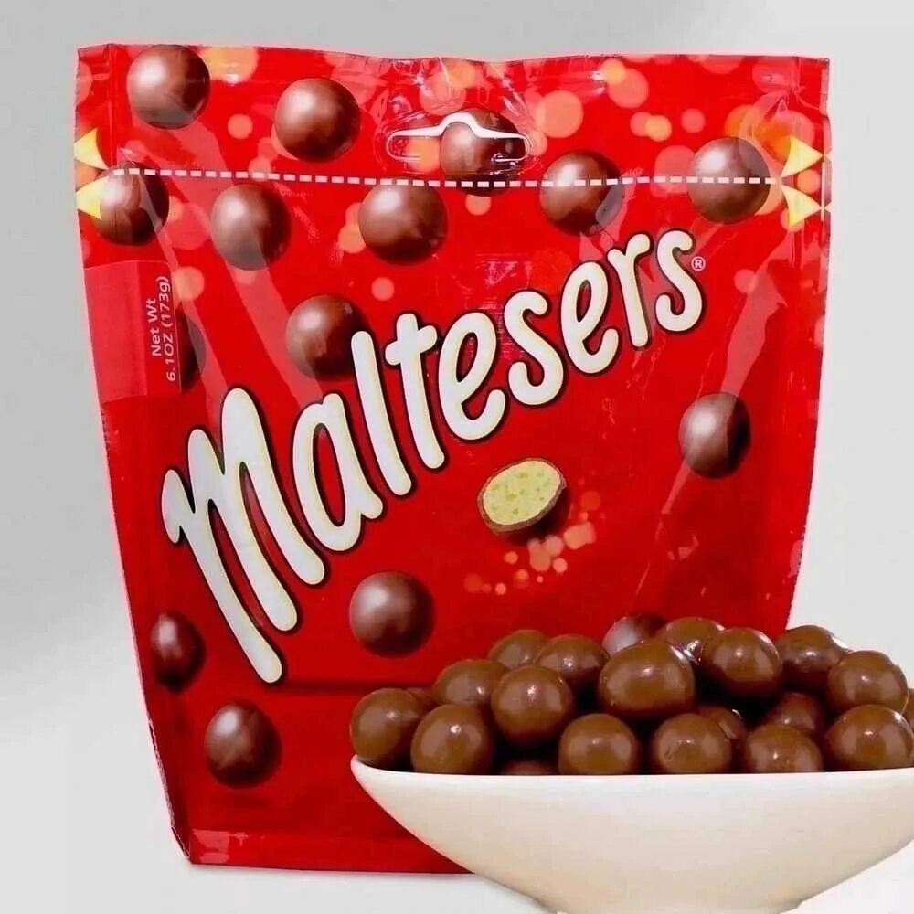 Шоколадное драже мальтизерс. Шарики в шоколаде maltesers. Maltesers драже шоколадные шарики 37. Шарики три кота 75. Круглые шоколадные шарики maltesers.