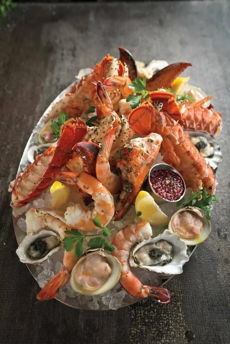 Море вкусного рыба. Экзотические морепродукты. тарелка с морепродуктами. красивые блюда из морепродуктов. деликатесы из морепродуктов.