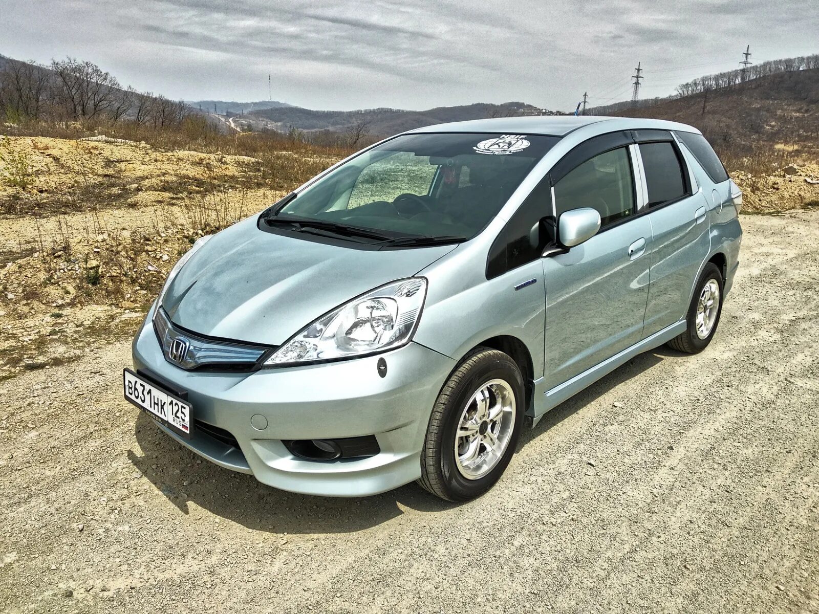 Хонда фит абакан. Honda Fit Shuttle. Honda Fit Shuttle с панорамной крышей. Honda Fit Shuttle бирюзовый. Хонда фит шаттл 2003.