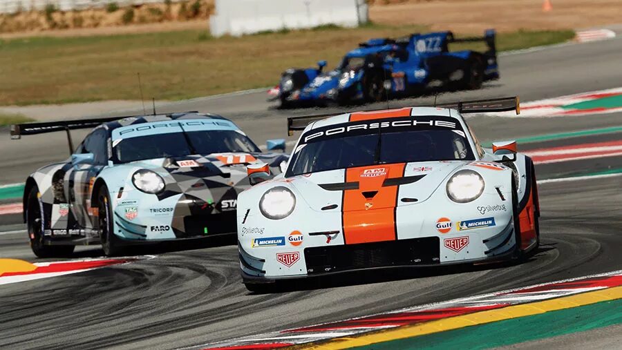 Racing uk. Porsche Gulf Racing. Gulf в автоспорте. 911 Гт1 Гульф рейсинг. Porsche Gulf Racing 58.