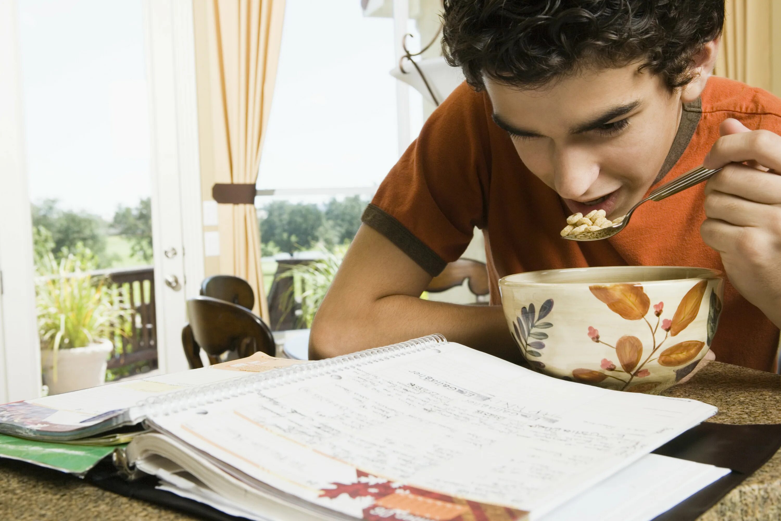 Tom started reading. Boy reading book. reads a book and plays sports.