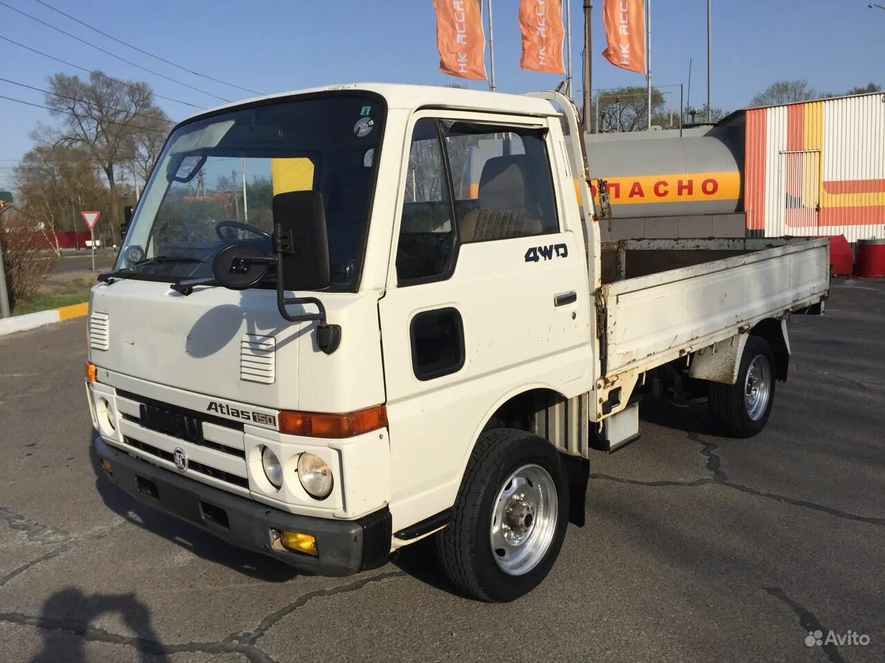 Грузовики купить амурская. Nissan Atlas 4wd 1990. Грузовик Ниссан атлас 4вд. Ниссан атлас 92. Ниссан атлас 4*4.