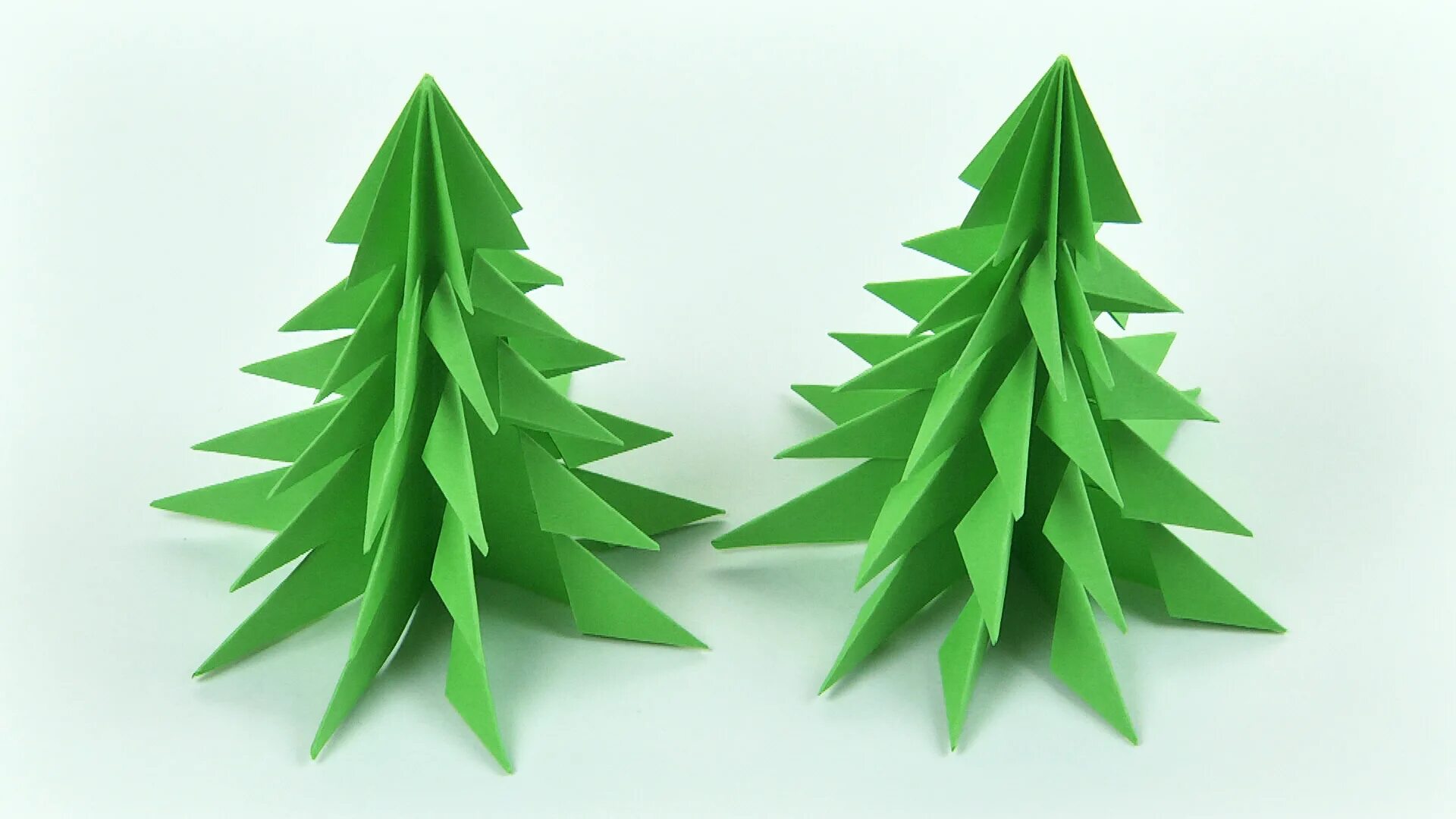 Елка оригами из бумаги. Елка из бумаги объемная. елка из картона объемная. оригами новогодняя елка. елка оригами из бумаги для открытки.