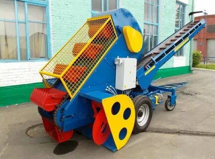 Ковшовый шнековый погрузчик кшп