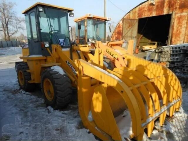 XCMG lw188. Фронтальный погрузчик XCMG lw188. XCMG lw500f челюстной захват. Челюстной захват на фронтальный погрузчик XCMG 3-трехтонный.