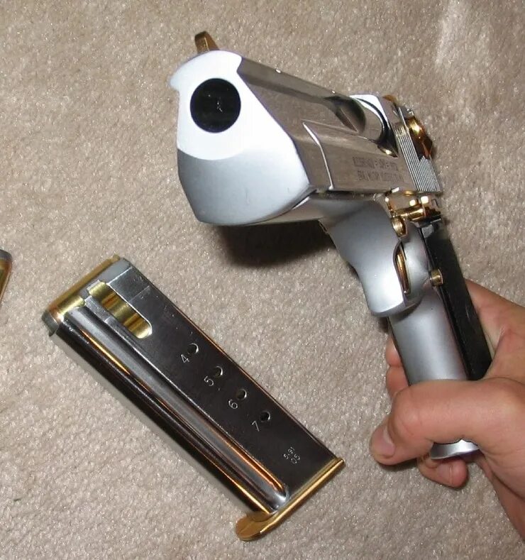 Самого мощного пистолета в мире. 500 s&w magnum. Taurus 1911. Desert eagle 50 ae выстрел. Самого мощного пистолета в мире.