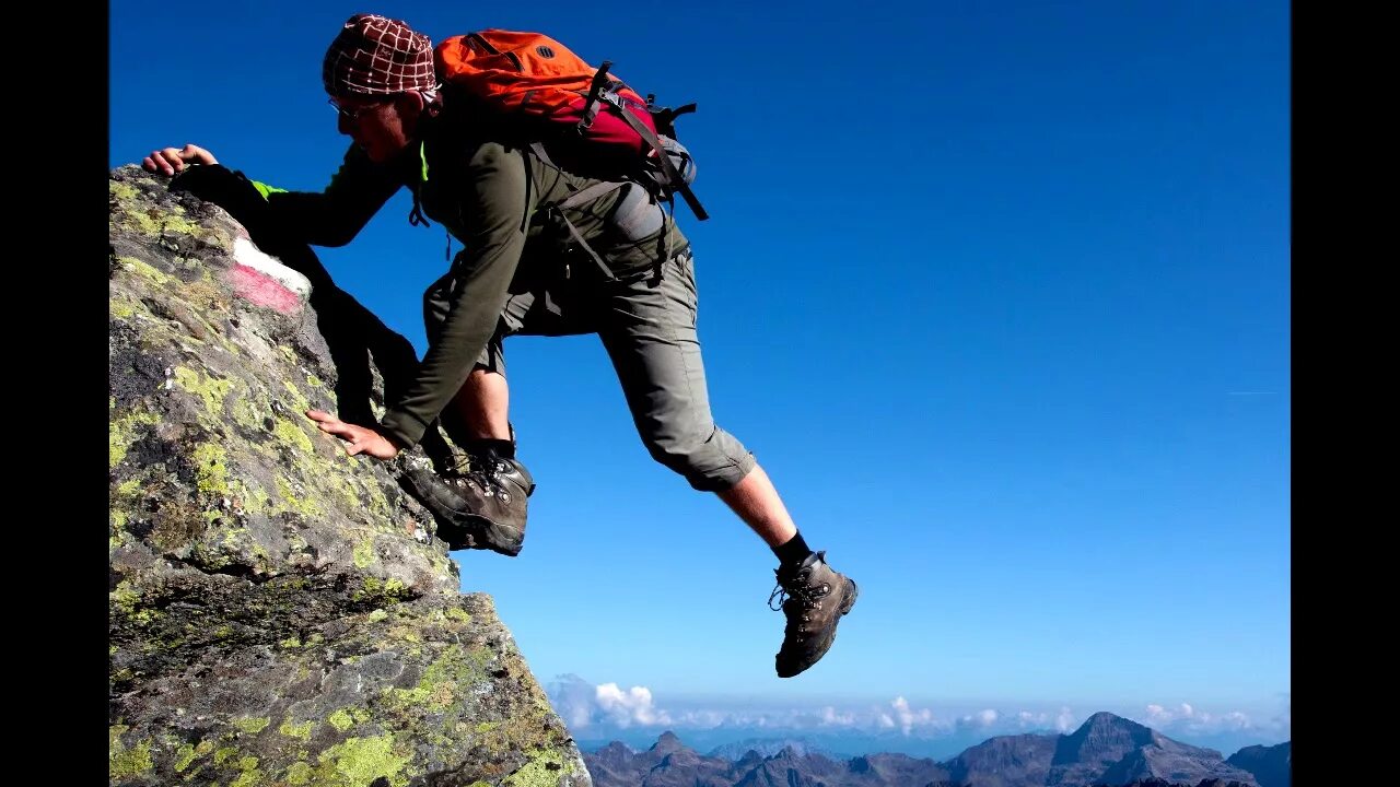 Travelling is possible. Трудный подъем в гору. Человек карабкается в гору. Человек в горах. Человек лезет в гору.