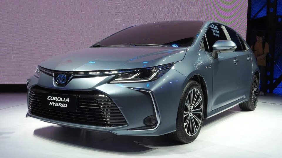 Toyota гибрид 2020. Toyota corolla 2020 rear. Toyota corolla sedan 2020. Toyota corolla 2019 hybrid. Toyota corolla 2021.