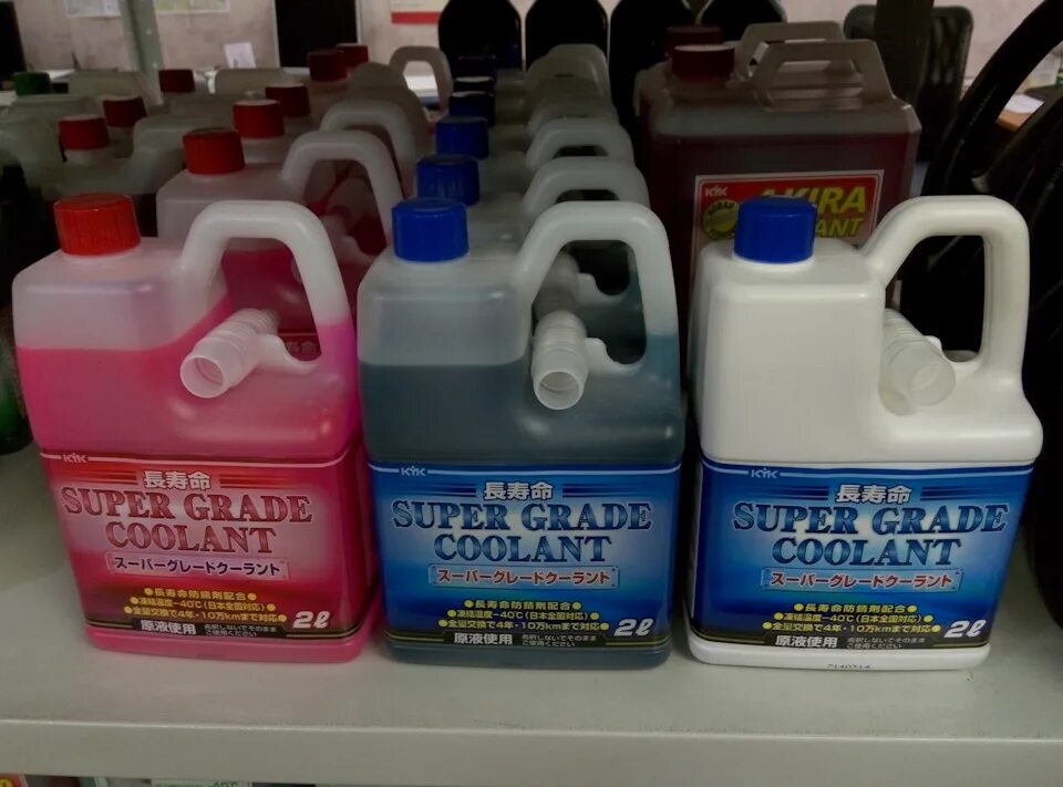 Антифриз super llc. Super grade coolant антифриз. антифриз suzuki super coolant. super grade coolant антифриз honda. антифриз suzuki llc super синий.