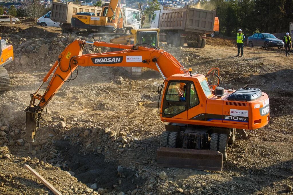 Колeсный экскаватор doosan 210. Экскаватор doosan solar 210w-v. Дусан 210. Экскаватор дусан 210. Экскаватор дусан 210.