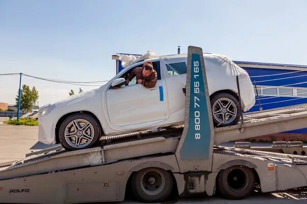 Импокар перевозка автомобилей. Импокар автовозы. автовоз с машинами и вертолетом арктика. автовоз транспортное средство фото.