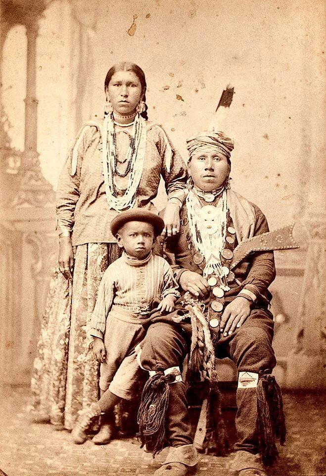 American 1800. America 1800s. Old photo three American indian Black Blancets Eagle Feathers.