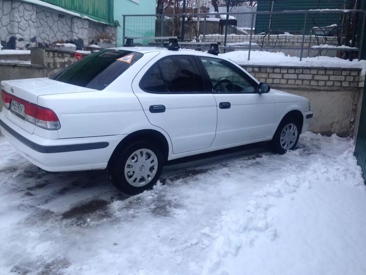 Купить ниссан санни в омске. Nissan Sunny 2000. Ниссан Санни 2000 b15. Ниссан Санни Санни 2000. Nissan Sunny 2000 год.