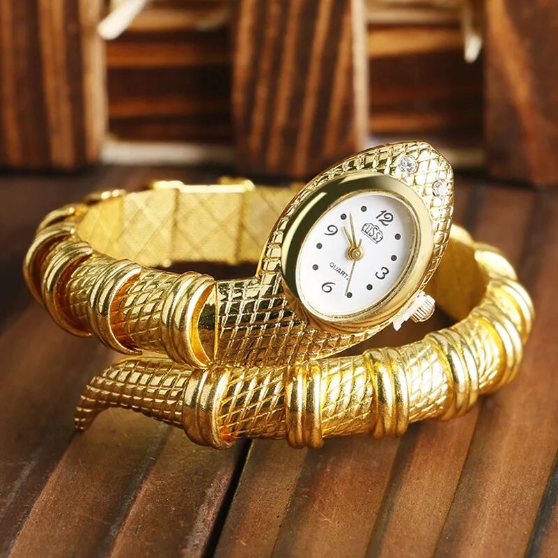 Watch snake. Часы змейка Bvlgari. Часы женские браслет змейка. Часы браслет змея. Наручные часы в виде змеи.