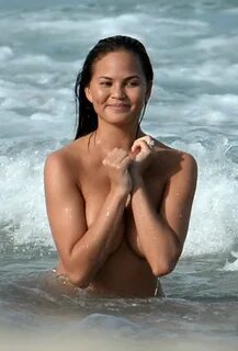 Chrissy Teigen Topless Photoshoot At Miami Beach.