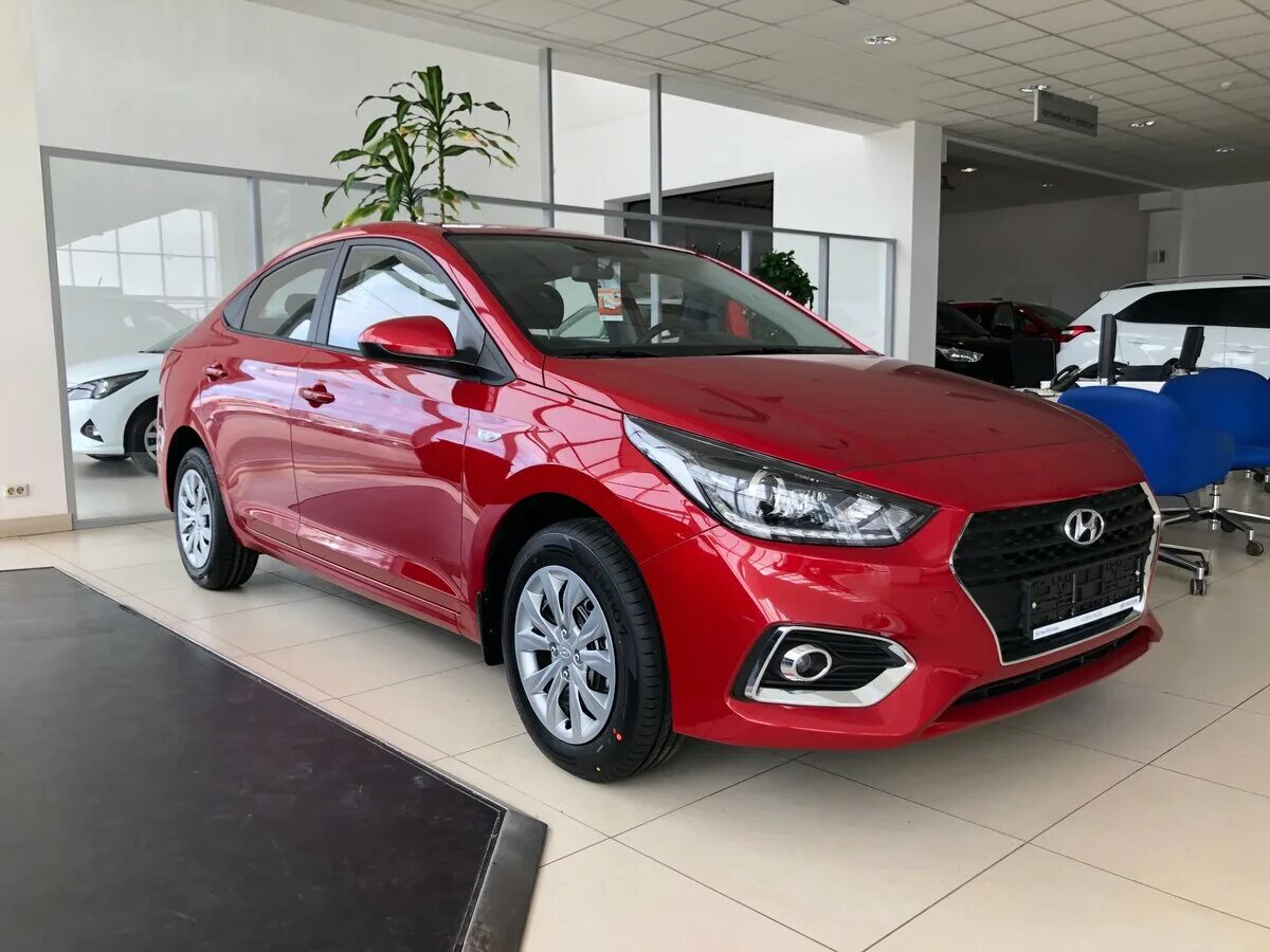 Купить новый солярис в спб. Hyundai Solaris 2021 Red. Hyundai Solaris 2021 красный. Хендай Солярис 2020 красный. Хендай Солярис 2017 красный.