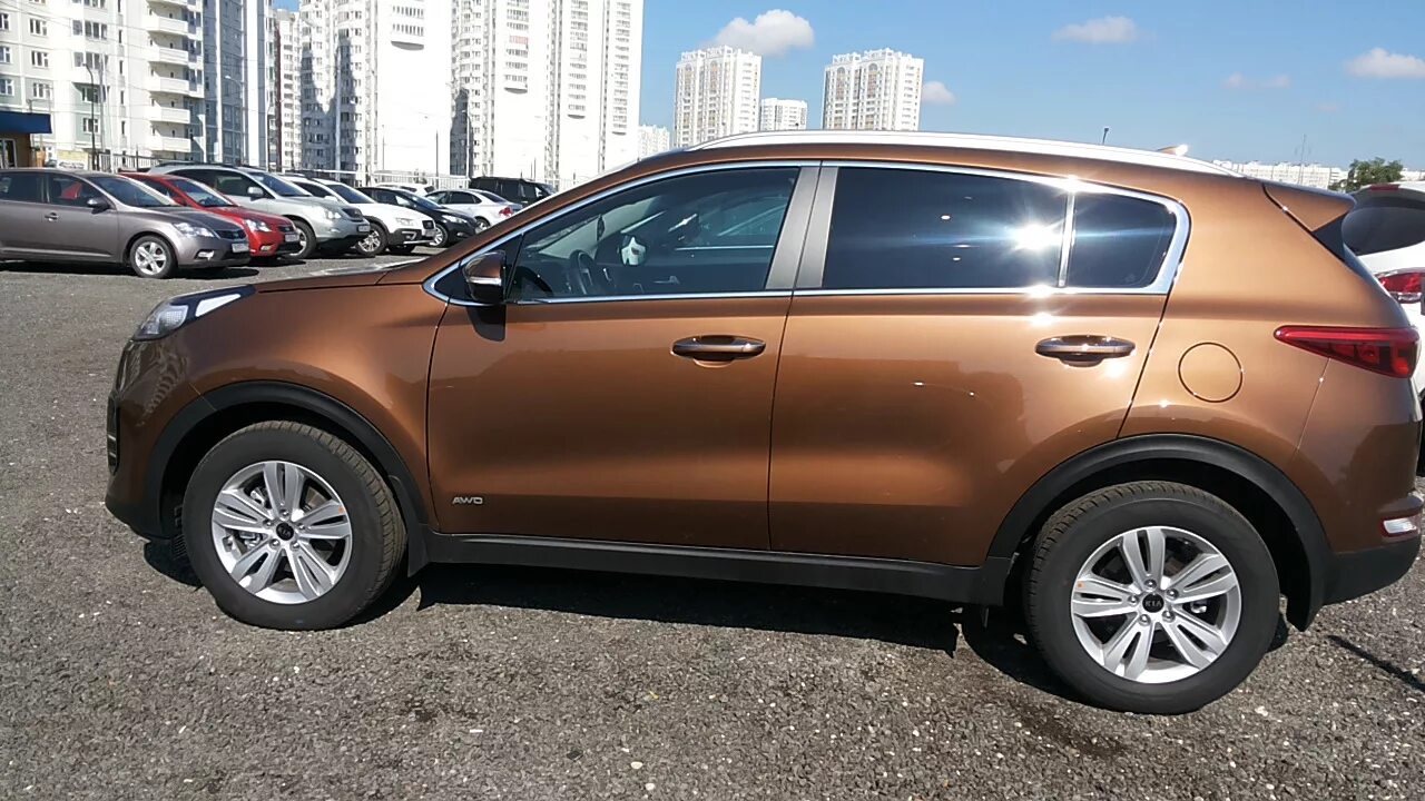 Brown car. Kia Sportage 2016 Brown. Kia Sportage Bronze. Киа Спортейдж 4 коричневый. Киа Спортейдж 4 2017 бронза.