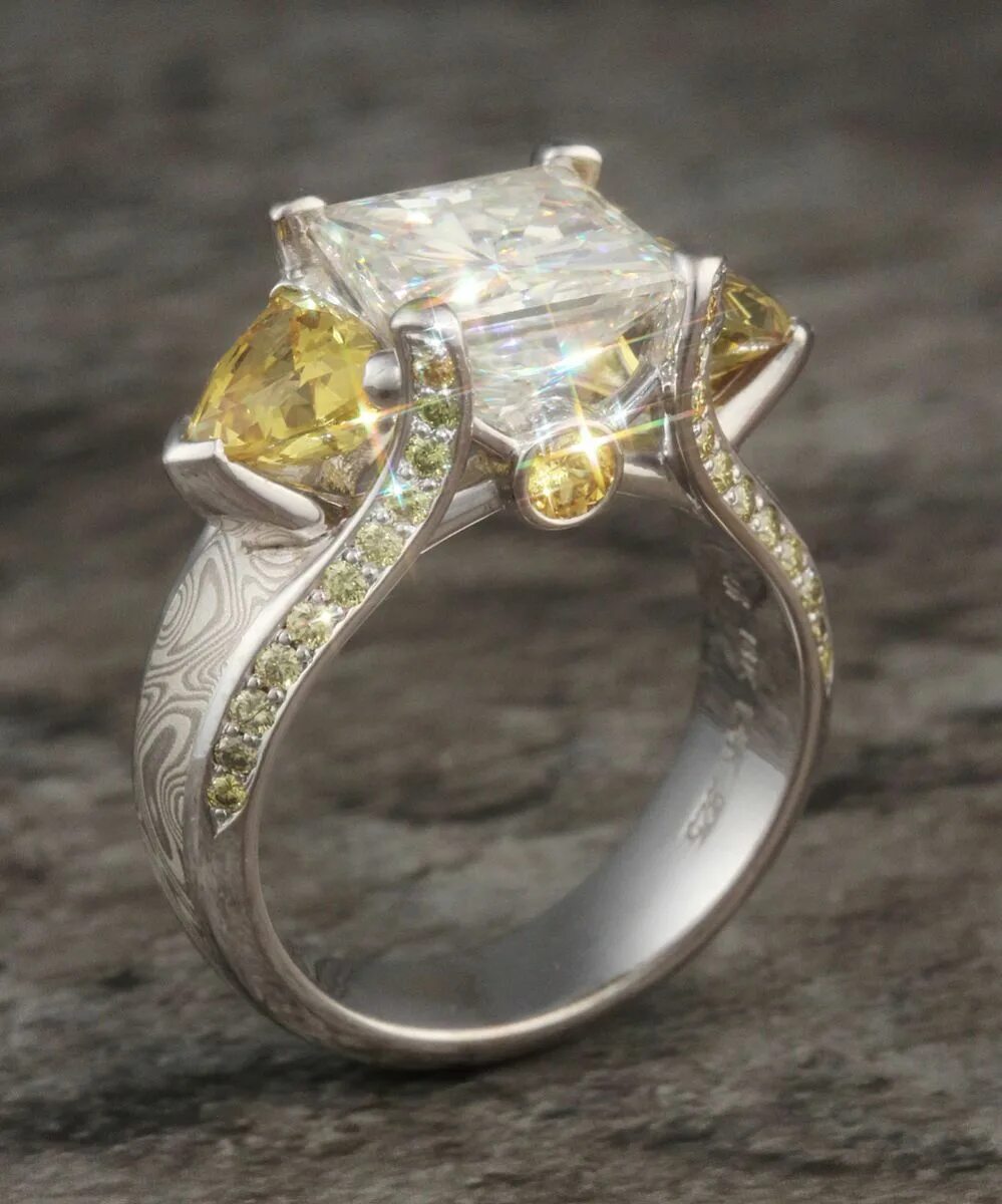 Ring has. Moissanite ring. 1975mi jewelry. alternate diamond.
